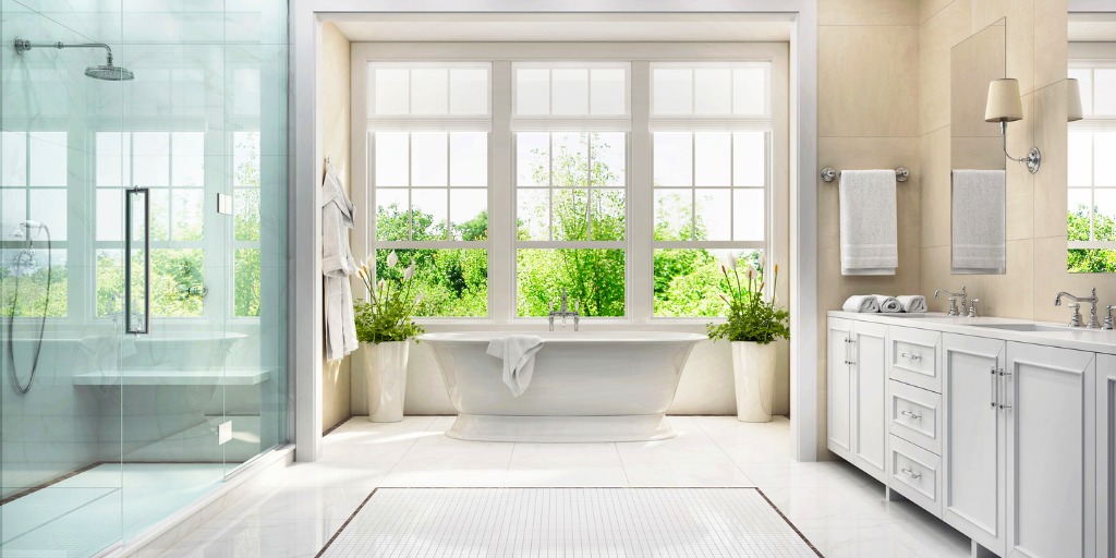 white-bathroom-with-bath-and-large-window-picture-id1221362919